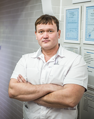 врач имплантолог
